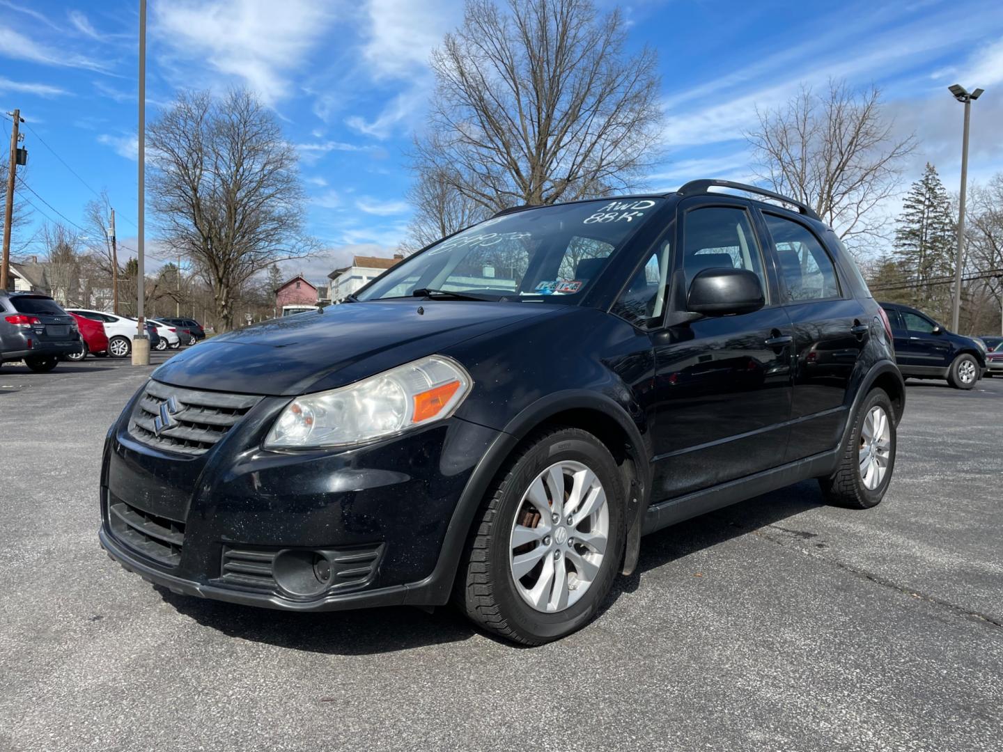 2013 black Suzuki SX4 Crossover Premium AWD (JS2YB5A36D6) with an 2.0L L4 DOHC 16V engine, located at 101 N. Main Street, Muncy, PA, 17756, (570) 546-5462, 41.207691, -76.785942 - Photo#0